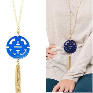 Cobalt blue circular traveling resin pendant necklace